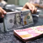 Rupiah Tembus Level Rp18.000 per Dolar AS